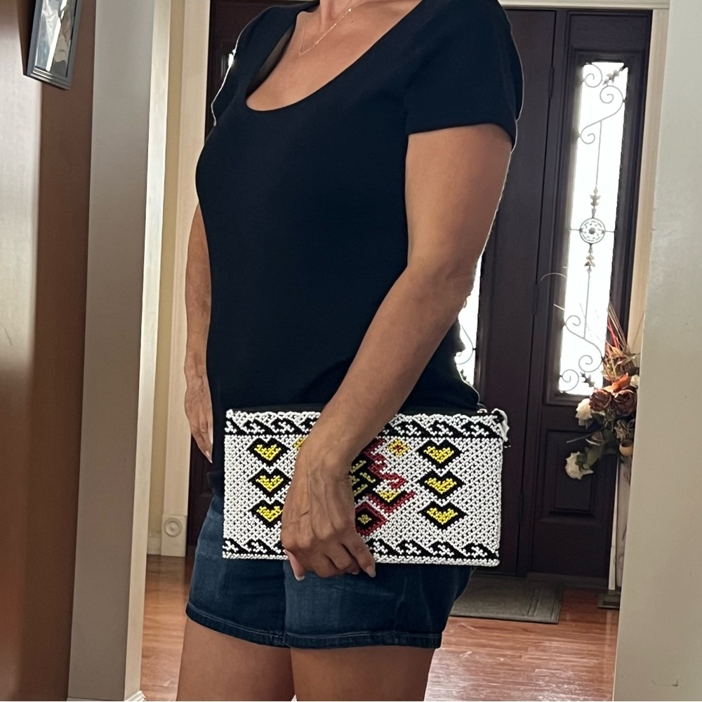 Beaded clutch from Indonesia .